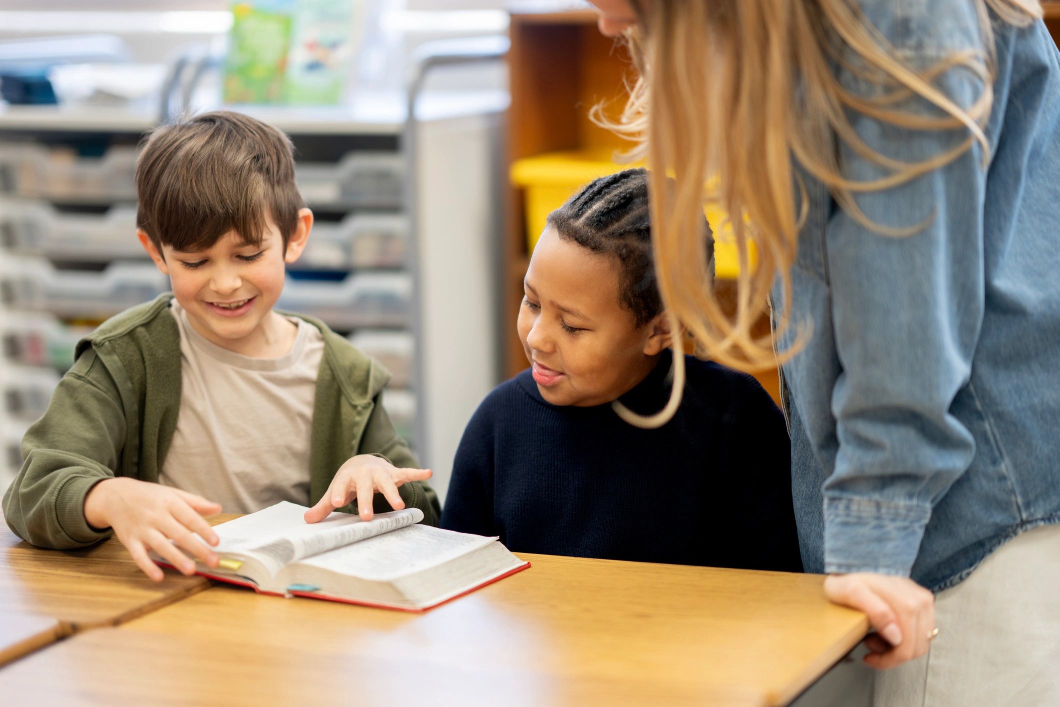 People gathered around reading and learning together